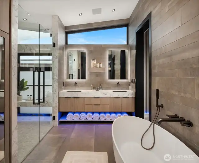 The spa bath is to die for. These rooms offer marble trim, designer tiled walls and marble countertops.