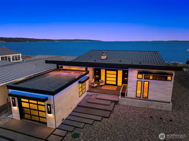 LED mood lighting is under ever steel and wood soffit. This is such an incredible west facing masterpiece!