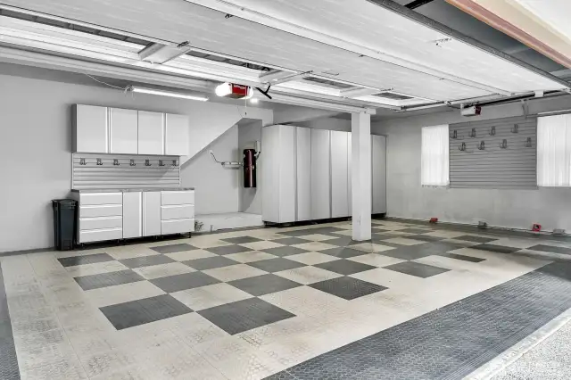 3 car garage, pristine with plenty of storage.
