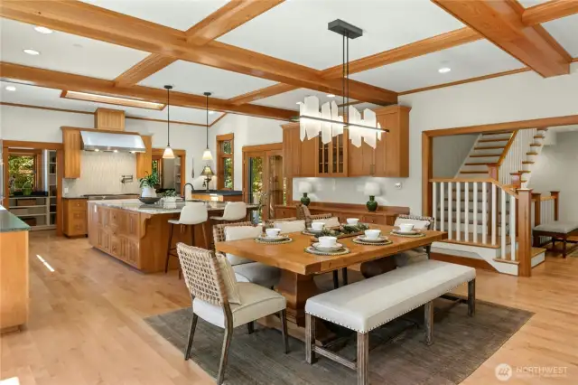Newly Renovated Chef's kitchen offers oversized Island with Quartz Countertops with breakfast bar.  Commercial Grade appliances include Sub-zero Refrigerator, Wolf Gas Stove & Double oven plus a warming Drawer and Pot Filler.  Built in Desk, Prep sink and access to outdoor living space with gas grill hook-ups are additional features.
