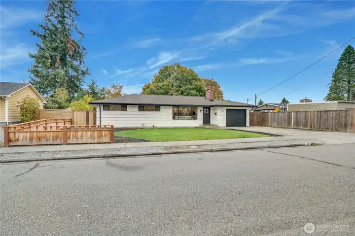 Brand-new roof, chimney flashing, gutters, exterior paint and sod delivers curb appeal that lasts.