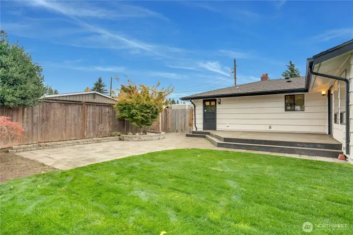 New composite deck off the family room for low-maintenance outdoor living. Back door leads directly into the mudroom. Additional RV parking/storage on the side of the house.