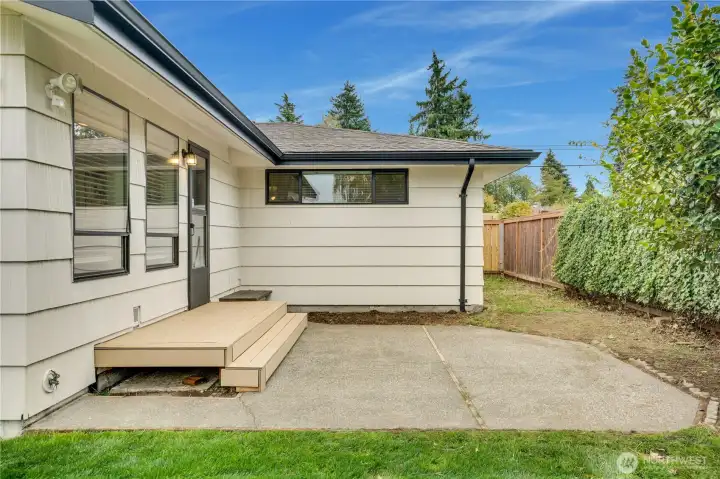Another outdoor space with direct access to the family room—ideal for a cozy fire pit and evening gatherings.