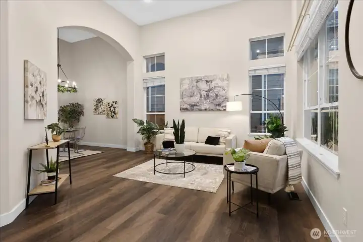 Soaring ceilings and luxury flooring greet you on entry.