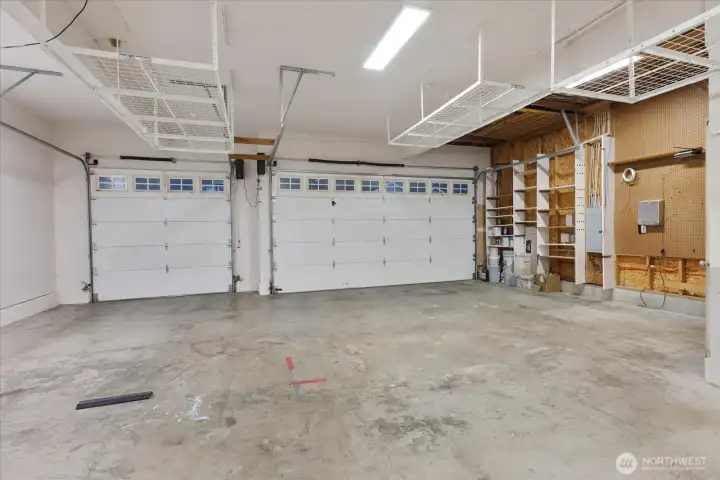 Large 3-car garage, providing ample space and convenience for vehicle storage and other use