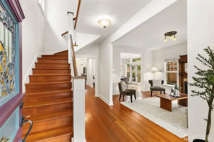 Enter the home to soaring ceilings and spacious, light filled rooms.