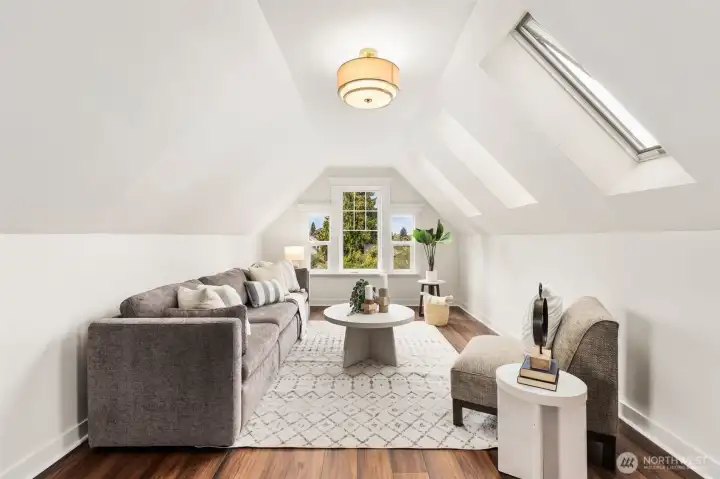 3rd level extended bonus room featuring new LVP flooring, new light fixtures. Enjoy plenty of natural light and a view of the Olympic Mountains.