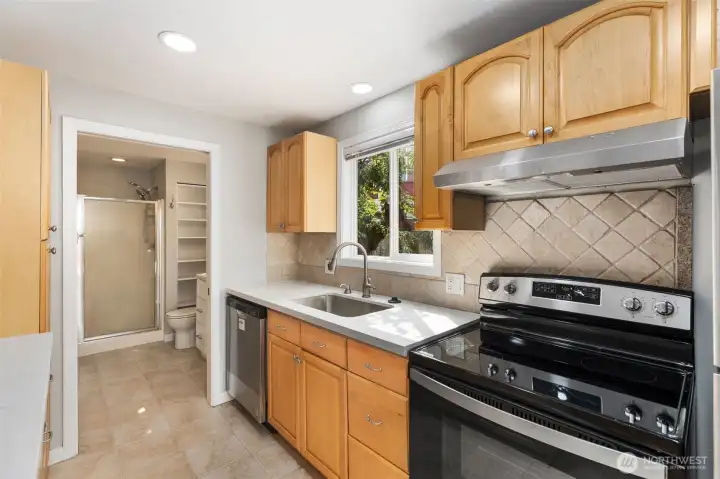 DADU features a full kitchen with new appliances and quartz countertops, 3/4 bath with stackable washer & dryer.