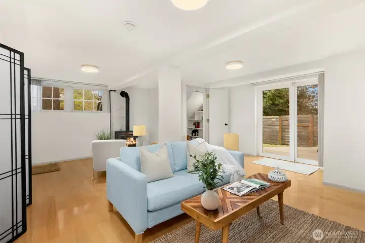 rec room has tons of windows and door to the yard.