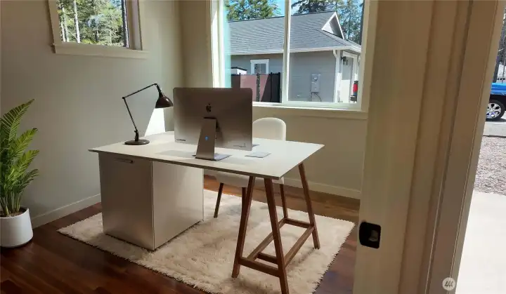 Den/Bonus room next to front door.