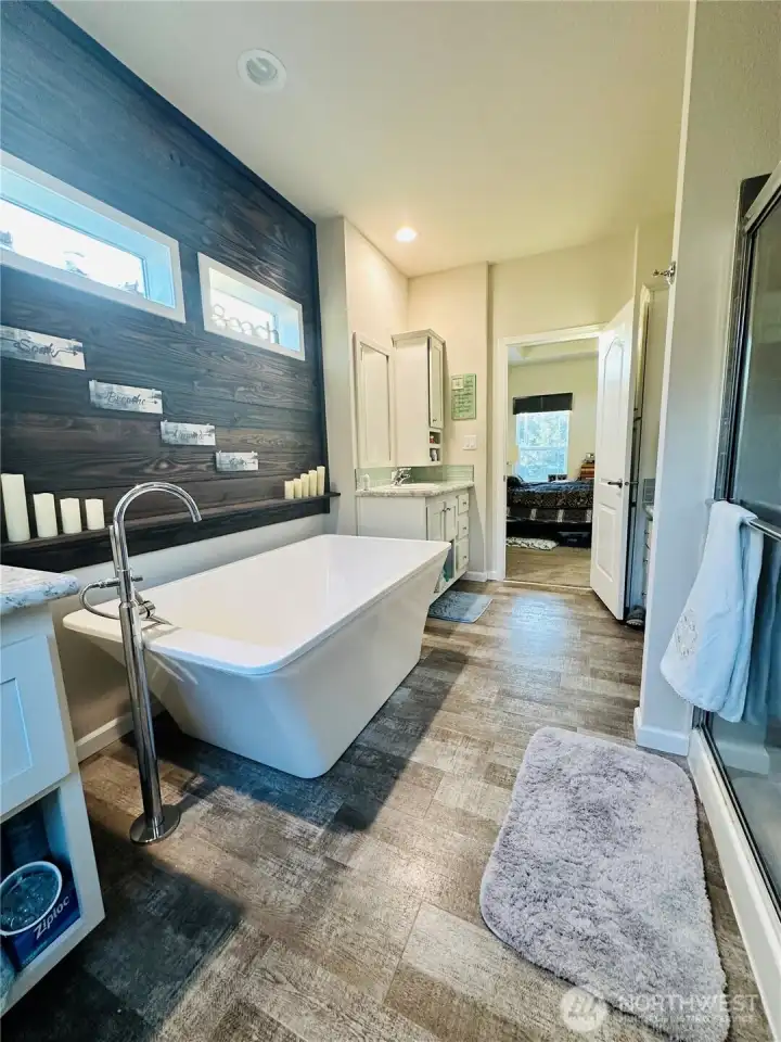 Soaker tub is in the large primary en-suite!