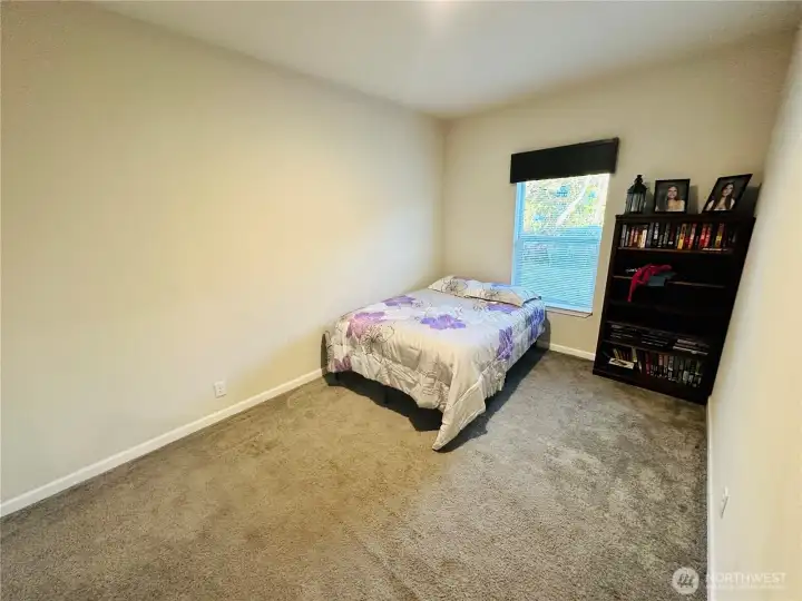 Bedroom three is spacious & has Walkin closet.