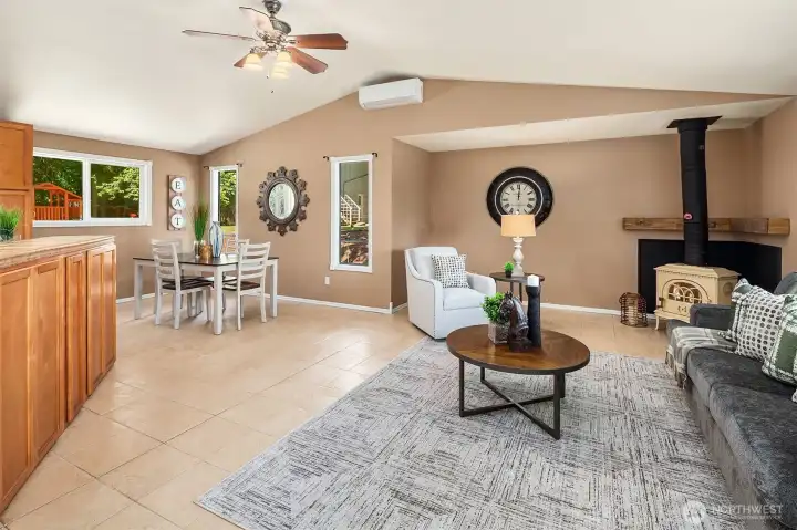 The great room combines the kitchen, living room, dining area and all with great views.