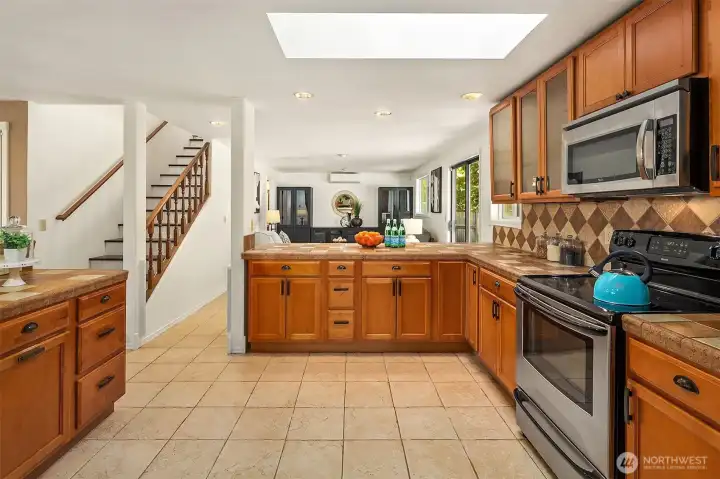 The kitchen also opens up to the family room.