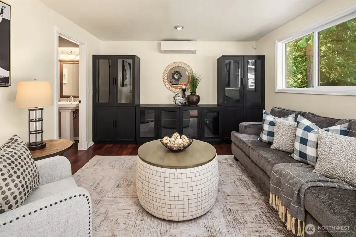 The family room with a half bathroom.