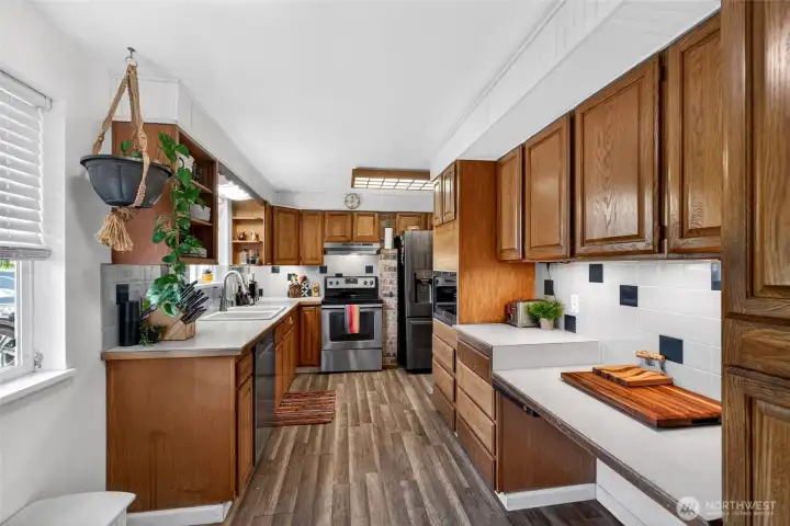 Easy-flow walk through design enhanced by not just one, but 2 windows for a view to the front.