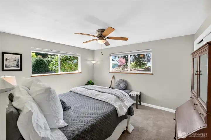 The 3rd bedroom has a plethora of light with 2 corner windows