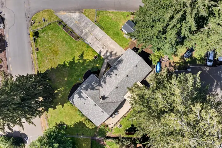 Perfectly positioned on a corner lot, this property enjoys a curtain of mature trees and a fully fenced setting.