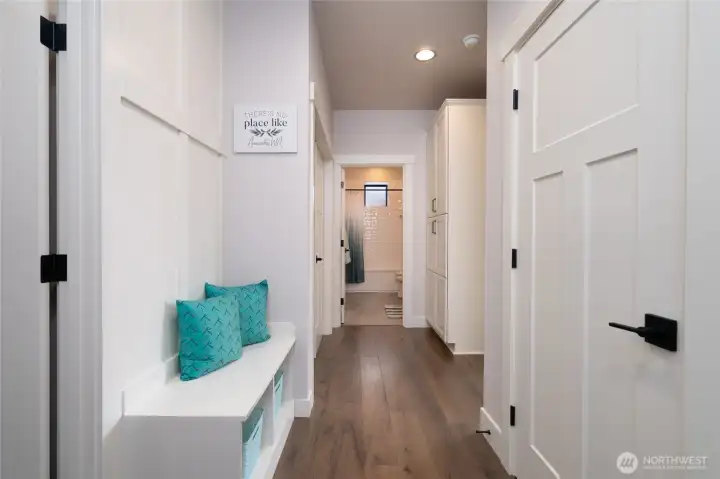 Welcoming hallway with custom built-ins and modern finishes throughout. Welcoming hallway with custom built-ins and modern finishes throughout.