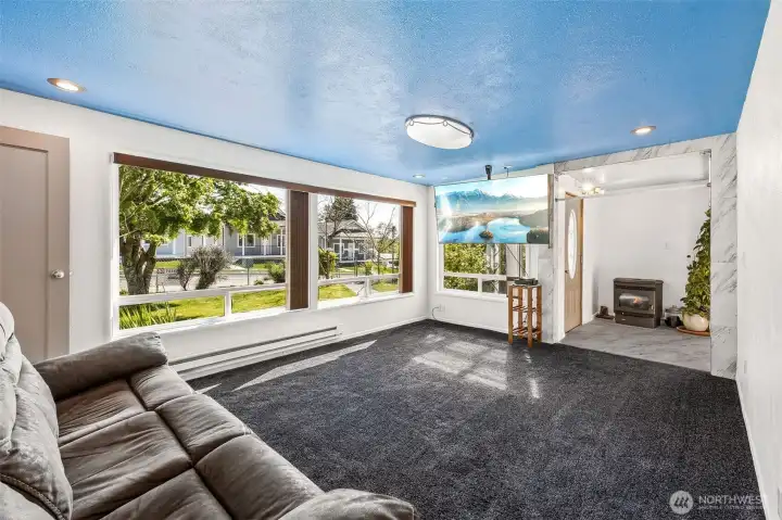 To capture that feeling indoors, the ceilings were thoughtfully painted sky blue, creating a light, cheerful atmosphere that reflects the warmth, optimism, and character this home has carried through generations.