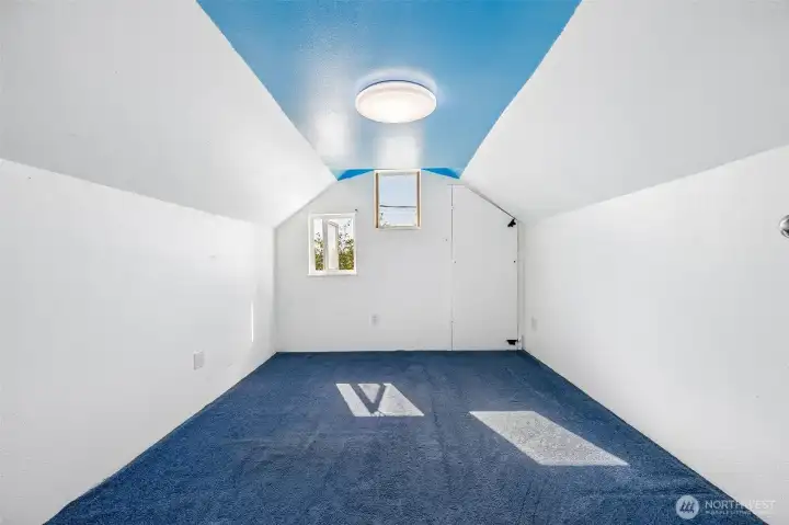 Upstairs bedroom with bonus area and 1/2 bath.