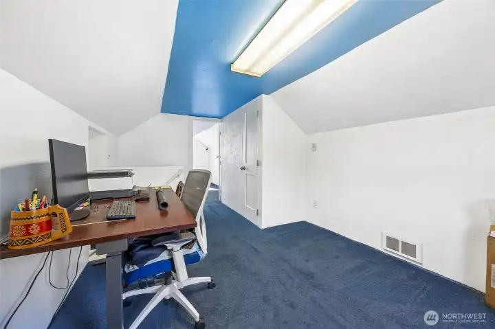 Upstairs bedroom with bonus area and 1/2 bath.