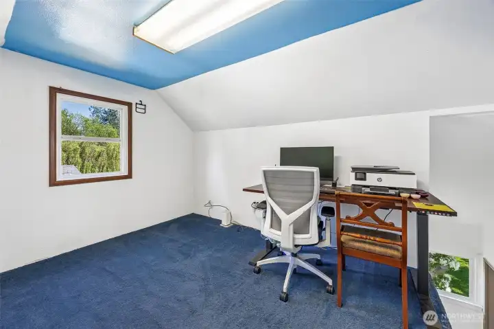 Upstairs bedroom with bonus area and 1/2 bath.
