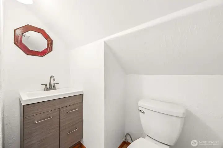 Upstairs half bath.