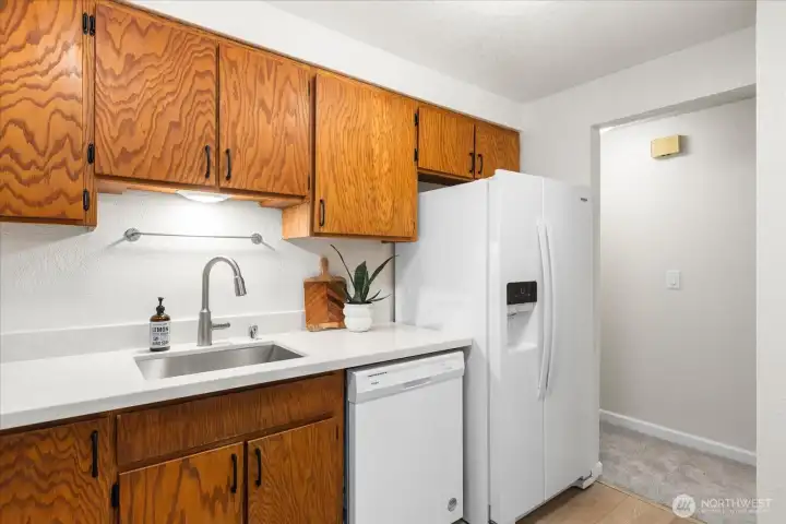 Solid wood cabinetry, new hardware and new quarts countertops.