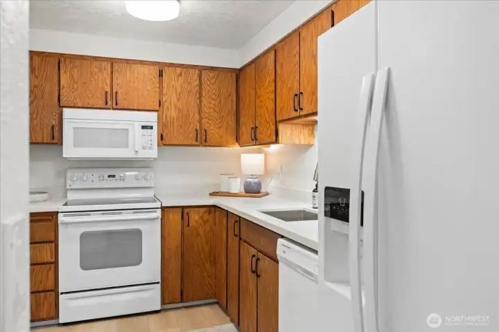 Solid wood cabinetry, new hardware and new quarts countertops.