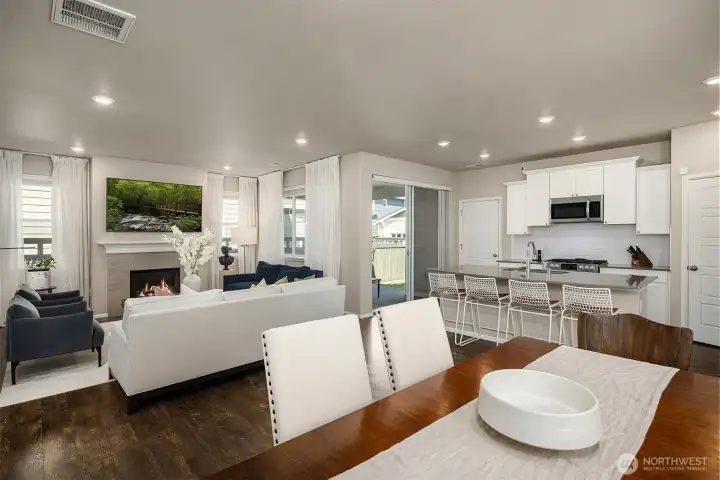 Spacious living and dining rooms with tall ceilings and great natural light