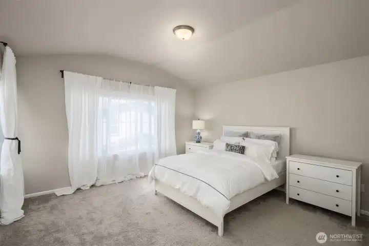 Huge primary bedroom with 5-piece en-suite bath and walkin closet