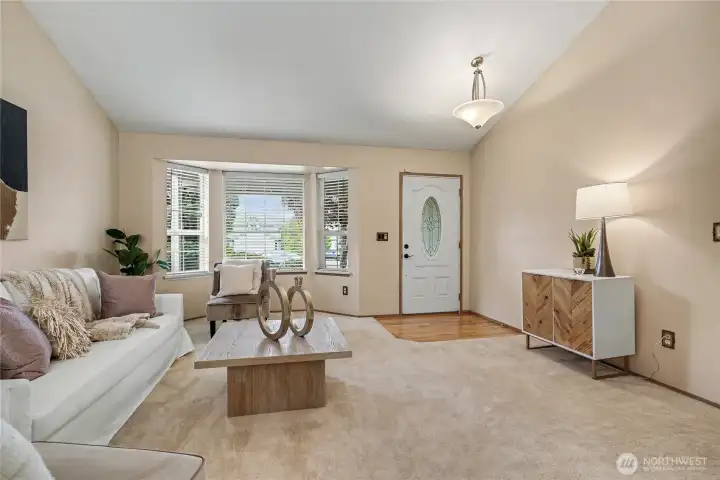 Formal living room with bay window.