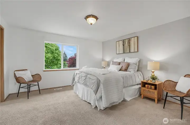 Upstairs primary with ensuite and walk-in closet.