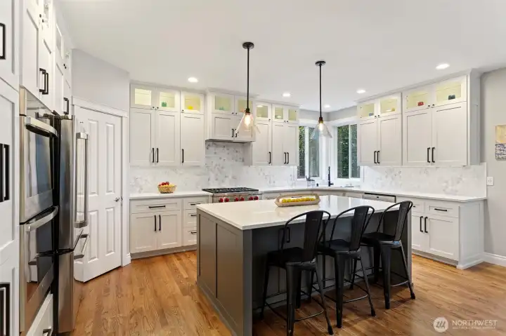 Chef's kitchen is a dream. Fully updated just a couple years ago. Custom cabinets with showcase upper level cabinets that stretch to the ceiling.
