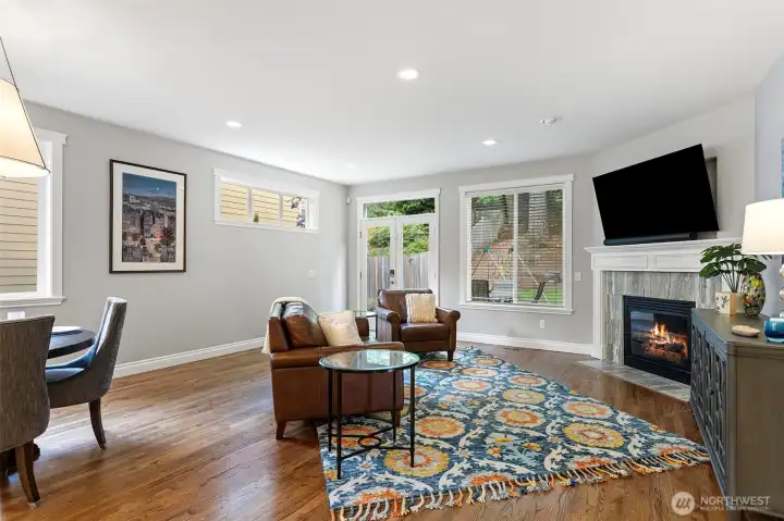 Family room with gas burning fireplace, and french doors out to the patio.