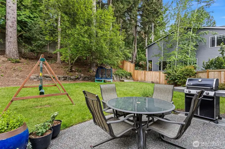 Patio off family room with access to oversized yard.