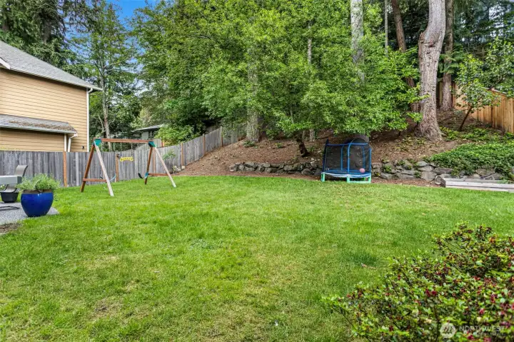 Yard is fenced from the sides and all the way around the back to keep pups and kids safe.