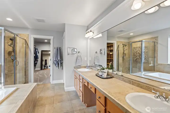 Five piece bath with vanity space.