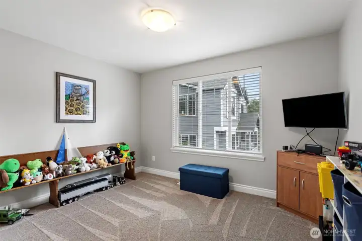 Upper level bedroom 1 with south facing window.
