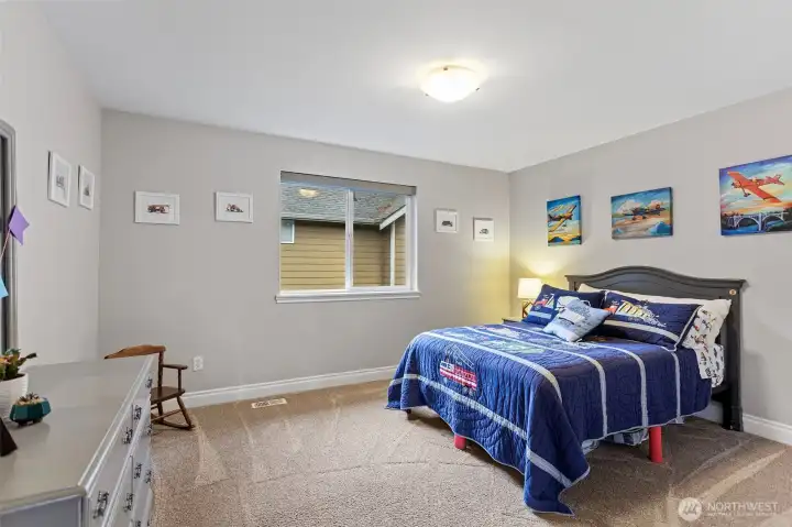 Upper level bedroom 3 with blackout shades.