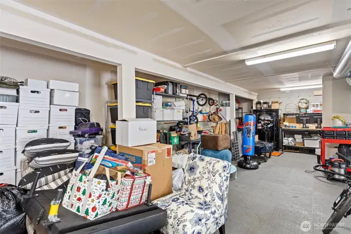 Storage and workbench area in garage.