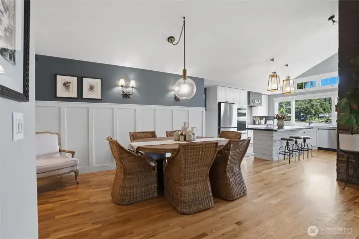 Expansive dining room designed to accommodate tables of any size, featuring a seamless flow to the adjacent kitchen perfect for effortless entertaining and convenient serving. Expansive dining room designed to accommodate tables of any size, featuring a seamless flow to the adjacent kitchen perfect for effortless entertaining and convenient serving.