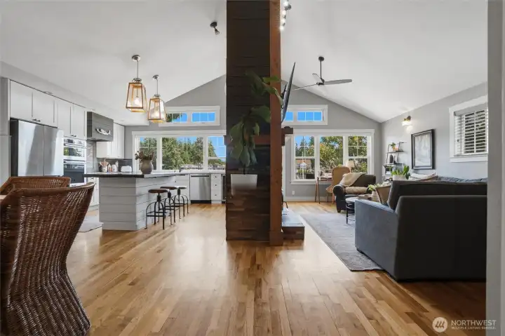 A large stone chimney accents the space between the large kitchen and living rooms and enjoys a wood burning fireplace to help keep things cozy on chilly Pacific Northwest days/night. A large stone chimney accents the space between the large kitchen and living rooms and enjoys a wood burning fireplace to help keep things cozy on chilly Pacific Northwest days/night.