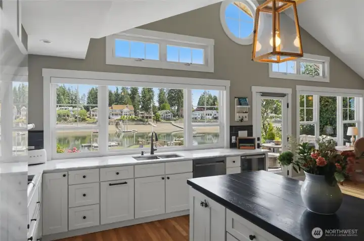 Expansive chef's kitchen featuring high-end appliances, custom cabinetry, and premium finishes. Enjoy the seamless flow of this space while cooking, entertaining, or handling kitchen cleanup with ease. This well-appointed area serves as the heart of the home, offering both functional efficiency and an inviting atmosphere for daily living. Expansive chef's kitchen featuring high-end appliances, custom cabinetry, and premium finishes. Enjoy the seamless flow of this space while cooking, entertaining, or handling kitchen cleanup with ease. This well-appointed area serves as the heart of the home, offering both functional efficiency and an inviting atmosphere for daily living.