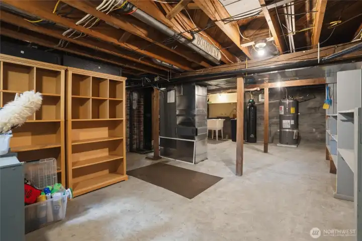 Basement features include ample dry storage space and convenient access to the home's utility systems. Basement features include ample dry storage space and convenient access to the home's utility systems.