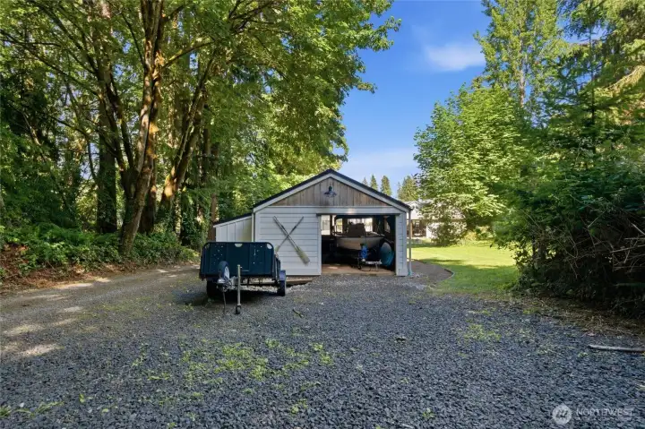 This spacious outbuilding serves as the perfect versatile storage solution, ideal for housing your vehicle, boat, or water toys. Whether you need a secure space for garden tools and mowers or simply desire extra room to keep your belongings protected and organized, this added structure offers the functionality and convenience required for your lifestyle needs. Key Benefits of this Outbuilding: * **Versatile Storage:** Ample room for seasonal equipment, recreational gear, and lawn maintenance machinery. * **Secure Protection:** Keeps your vehicles and equipment out of the elements, preserving their condition. * **Maximizes Utility:** Enhances the overall property functionality, allowing for a clutter-free garage or home environment. * **Multi-Purpose Use:** Adaptable space that can easily transition between a workshop, hobby area, or equipment shed This spacious outbuilding serves as the perfect versatile storage solution, ideal for housing your vehicle, boat, or water toys. Whether you need a secure space for garden tools and mowers or simply desire extra room to keep your belongings protected and organized, this added structure offers the functionality and convenience required for your lifestyle needs. Key Benefits of this Outbuilding: * **Versatile Storage:** Ample room for seasonal equipment, recreational gear, and lawn maintenance machinery. * **Secure Protection:** Keeps your vehicles and equipment out of the elements, preserving their condition. * **Maximizes Utility:** Enhances the overall property functionality, allowing for a clutter-free garage or home environment. * **Multi-Purpose Use:** Adaptable space that can easily transition between a workshop, hobby area, or equipment shed
