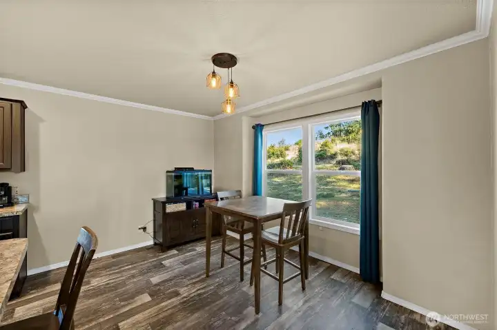Dine in kitchen with nice views outside.