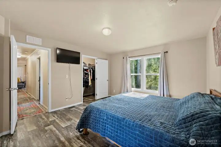 View from the primary ensuite into bedroom.