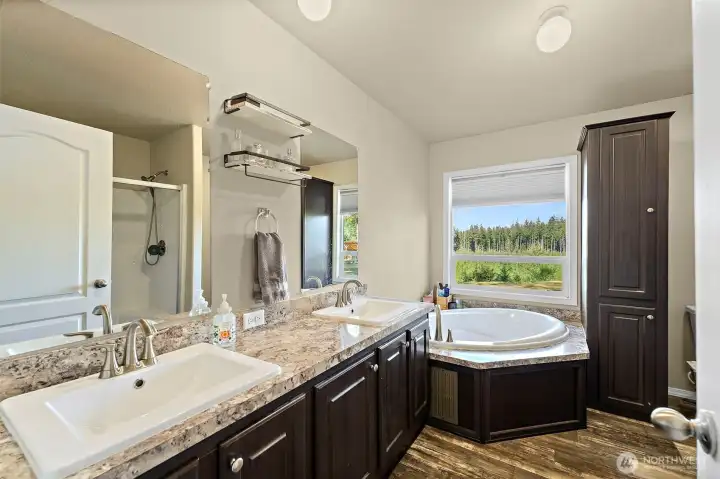 5 piece primary ensuite, with huge soaking tub and stand alone shower.